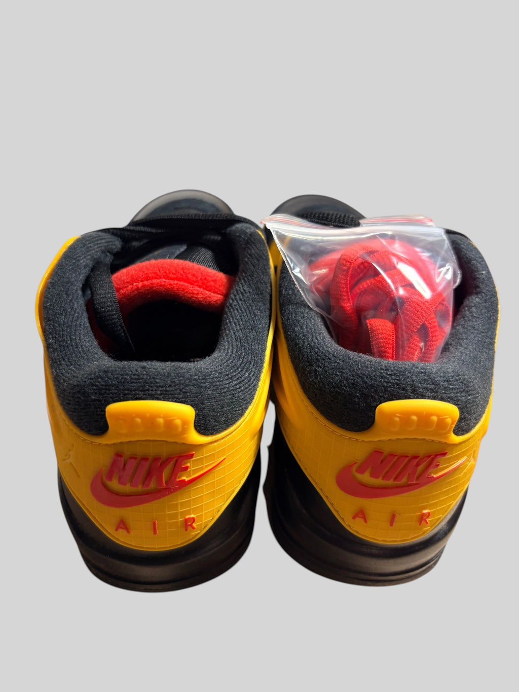 Air Jordan 4 RM "Bruce Lee" – Black / Del Sol (Neuf) AIR JORDAN