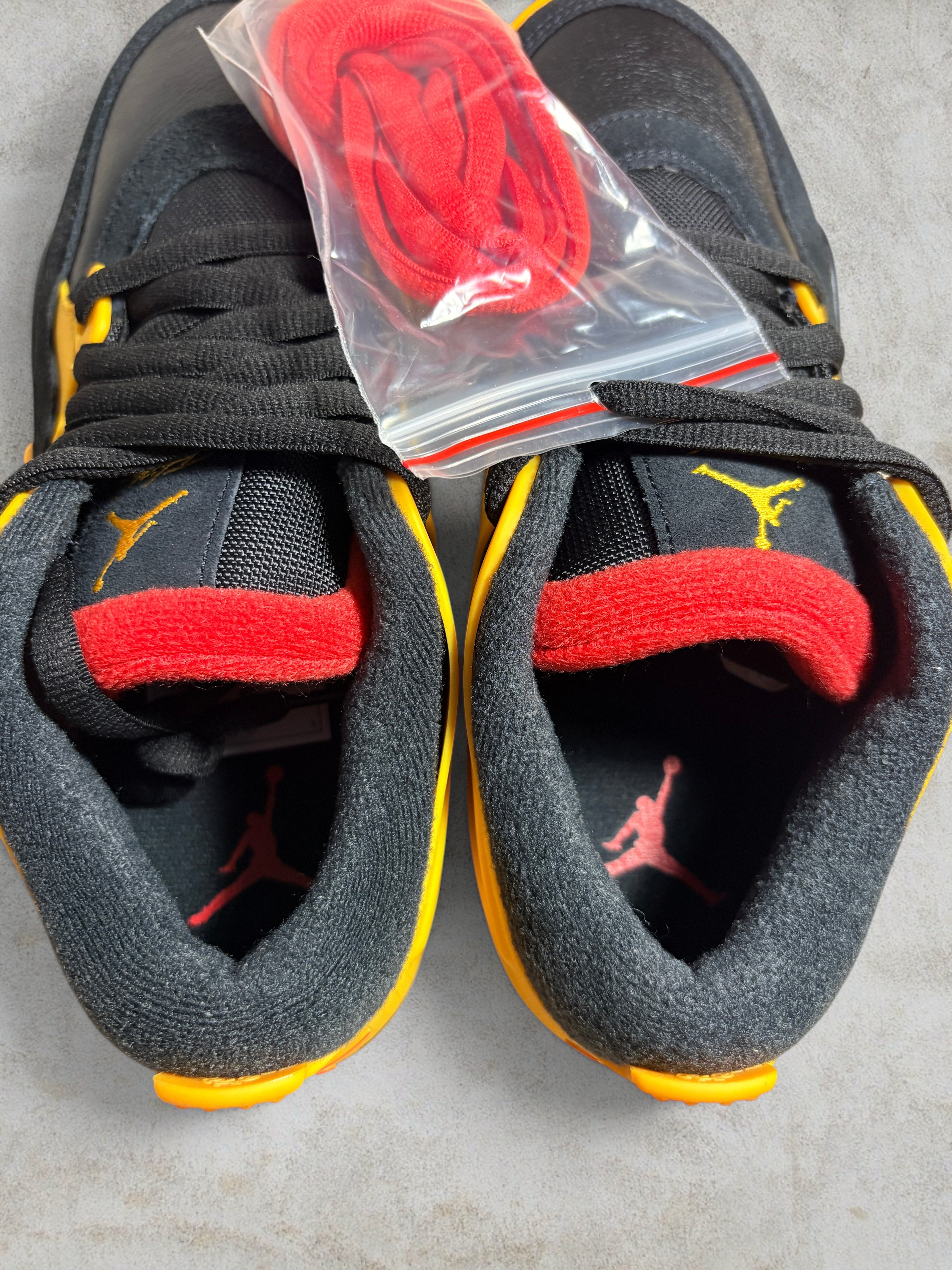 Air Jordan 4 RM "Bruce Lee" – Black / Del Sol (Neuf)