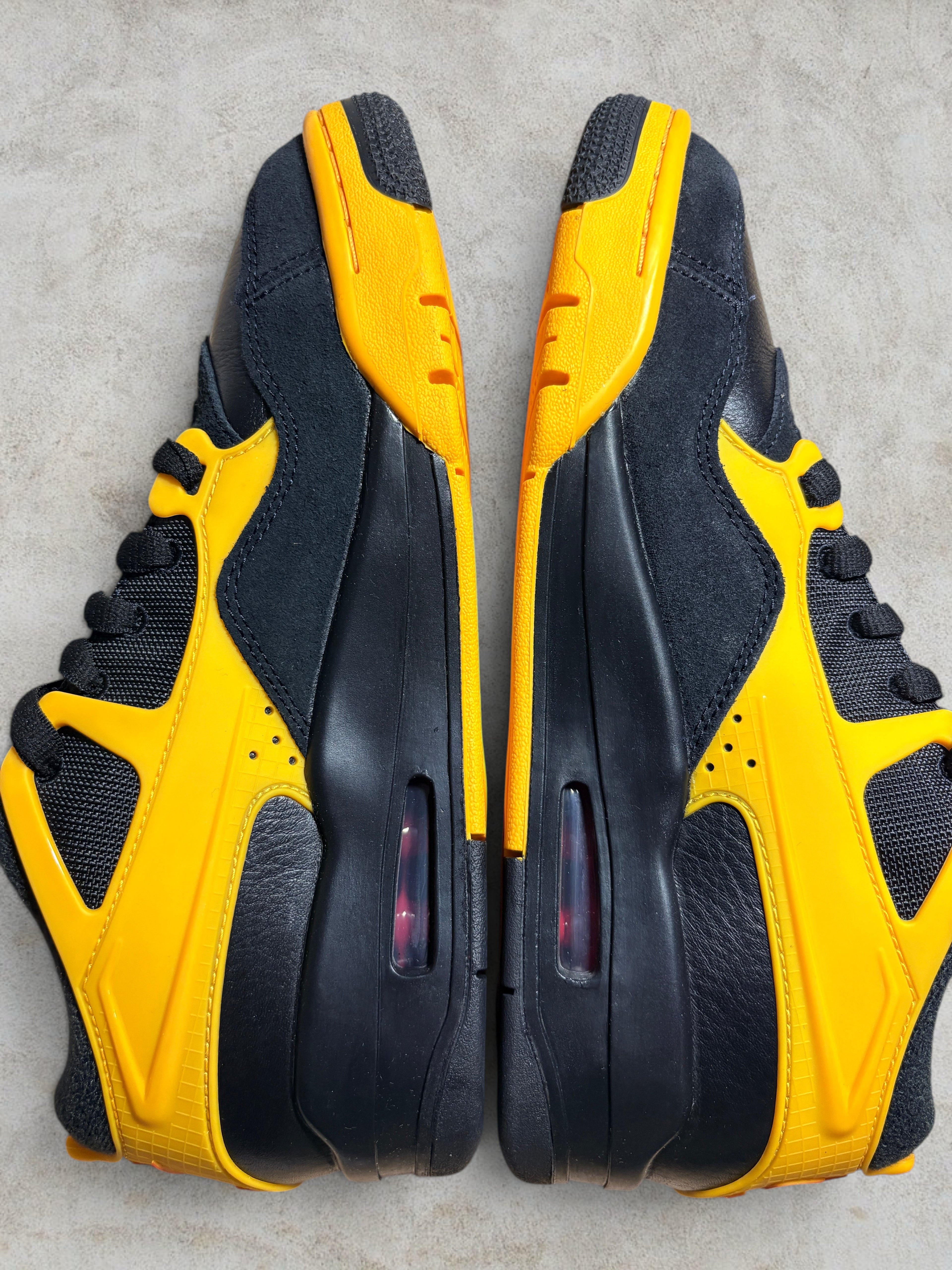 Air Jordan 4 RM "Bruce Lee" – Black / Del Sol (Neuf)