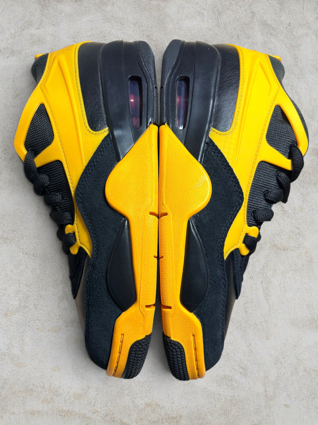 Air Jordan 4 RM "Bruce Lee" – Black / Del Sol (Neuf)