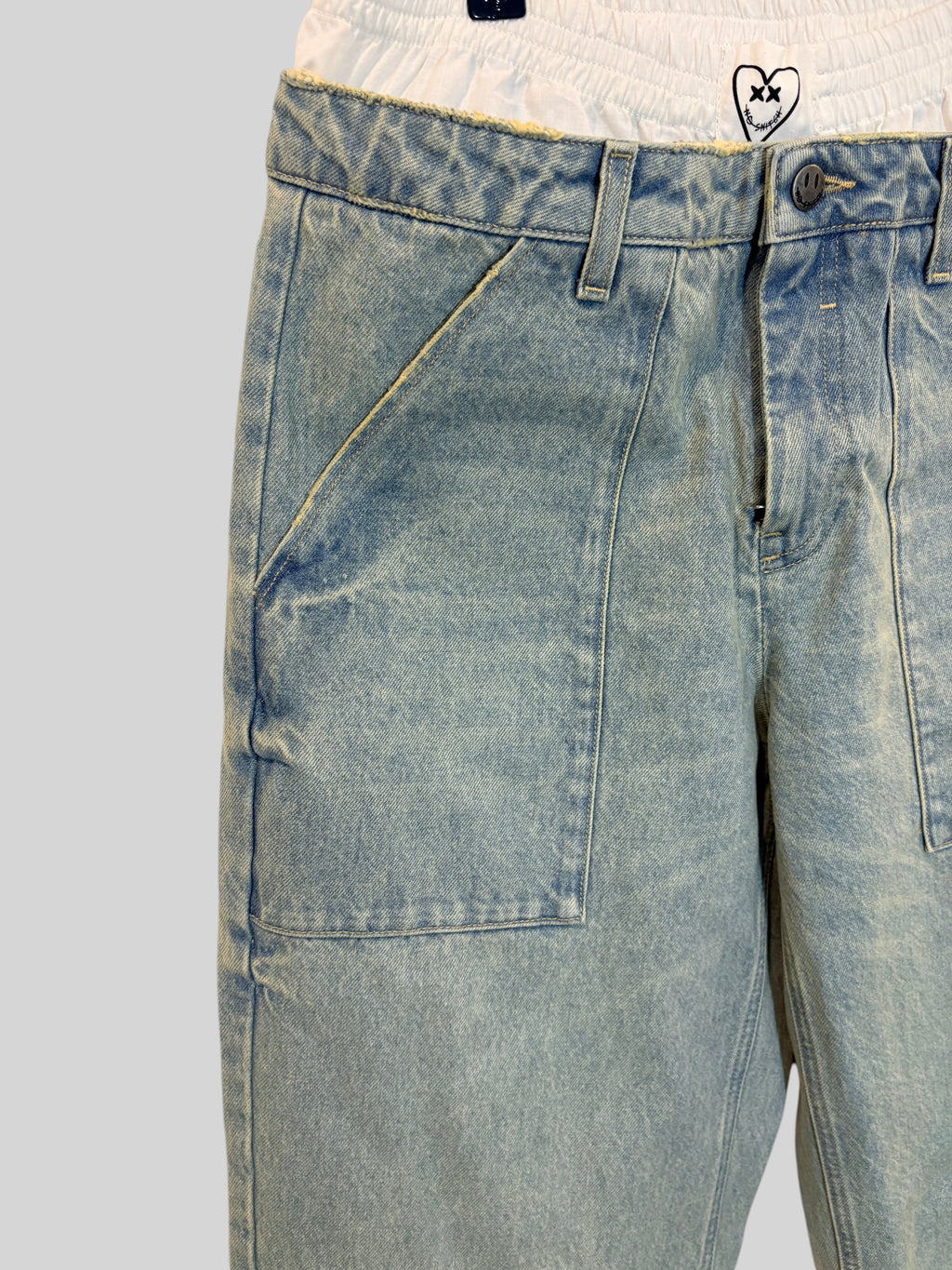 Pantalon FASHION SC Eleven Paris Nouni bleu délavé clair avec double taille élastique blanche et poches plaquées