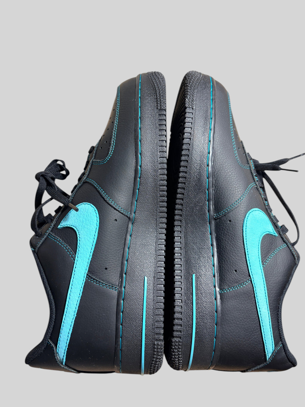 Baskets FASHION SC Nike Air Force 1 Low Un-Tiffany en cuir noir avec Swoosh et surpiqûres vert céleste contrastants
