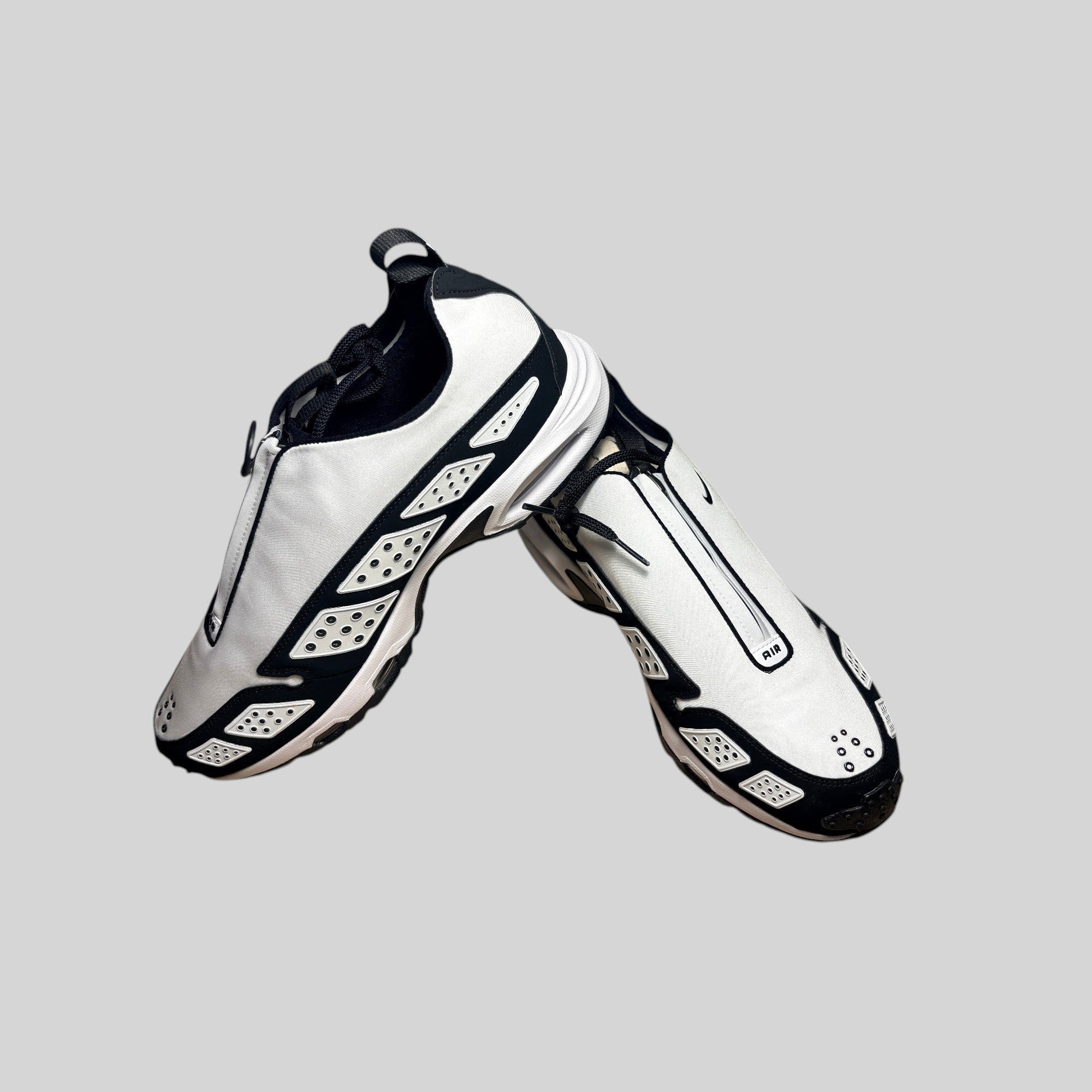 Baskets Nike Air Max SNDR FASHION SC noir et blanc avec fermeture zippée et amorti Max Air