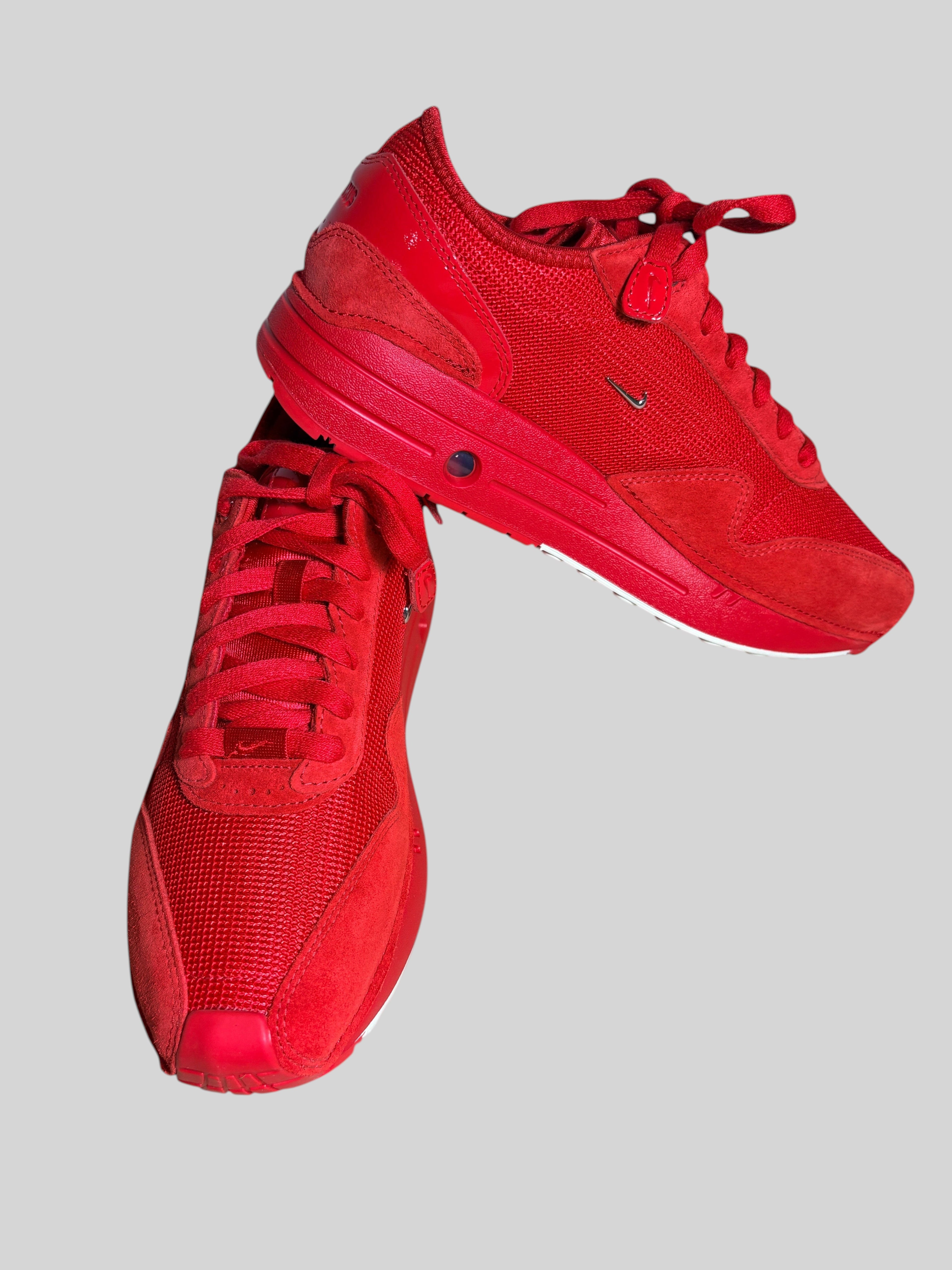 Baskets FASHION SC Nike x Jacquemus Air Max 1 '86 SP Mystic Red en cuir et daim rouge avec mini-Swoosh métallique
