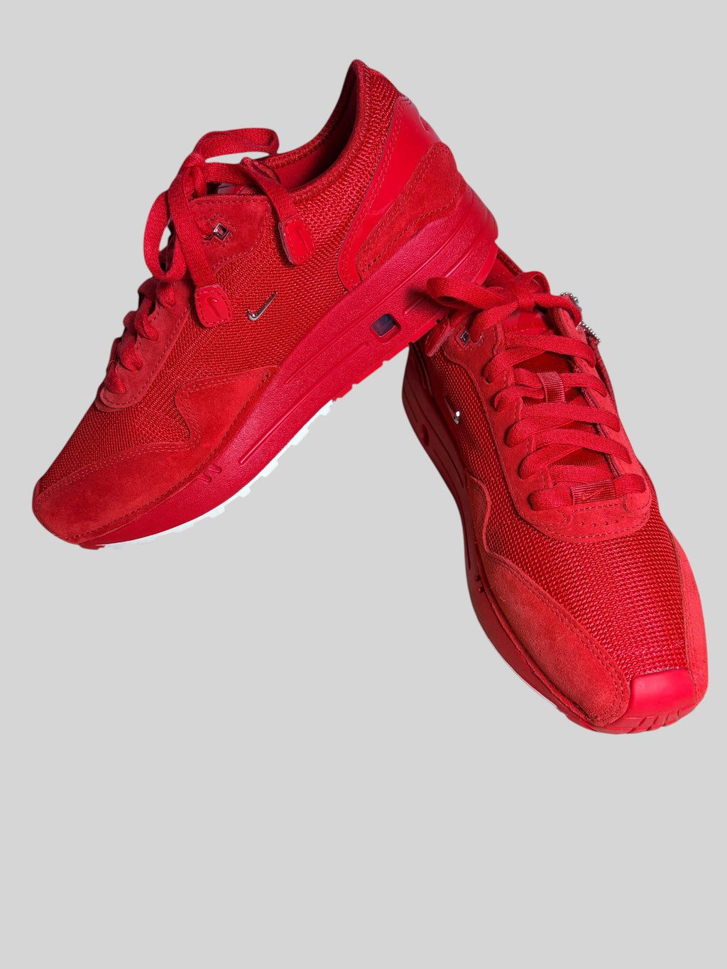 Baskets FASHION SC Nike x Jacquemus Air Max 1 '86 SP Mystic Red en cuir et daim rouge avec mini-Swoosh métallique