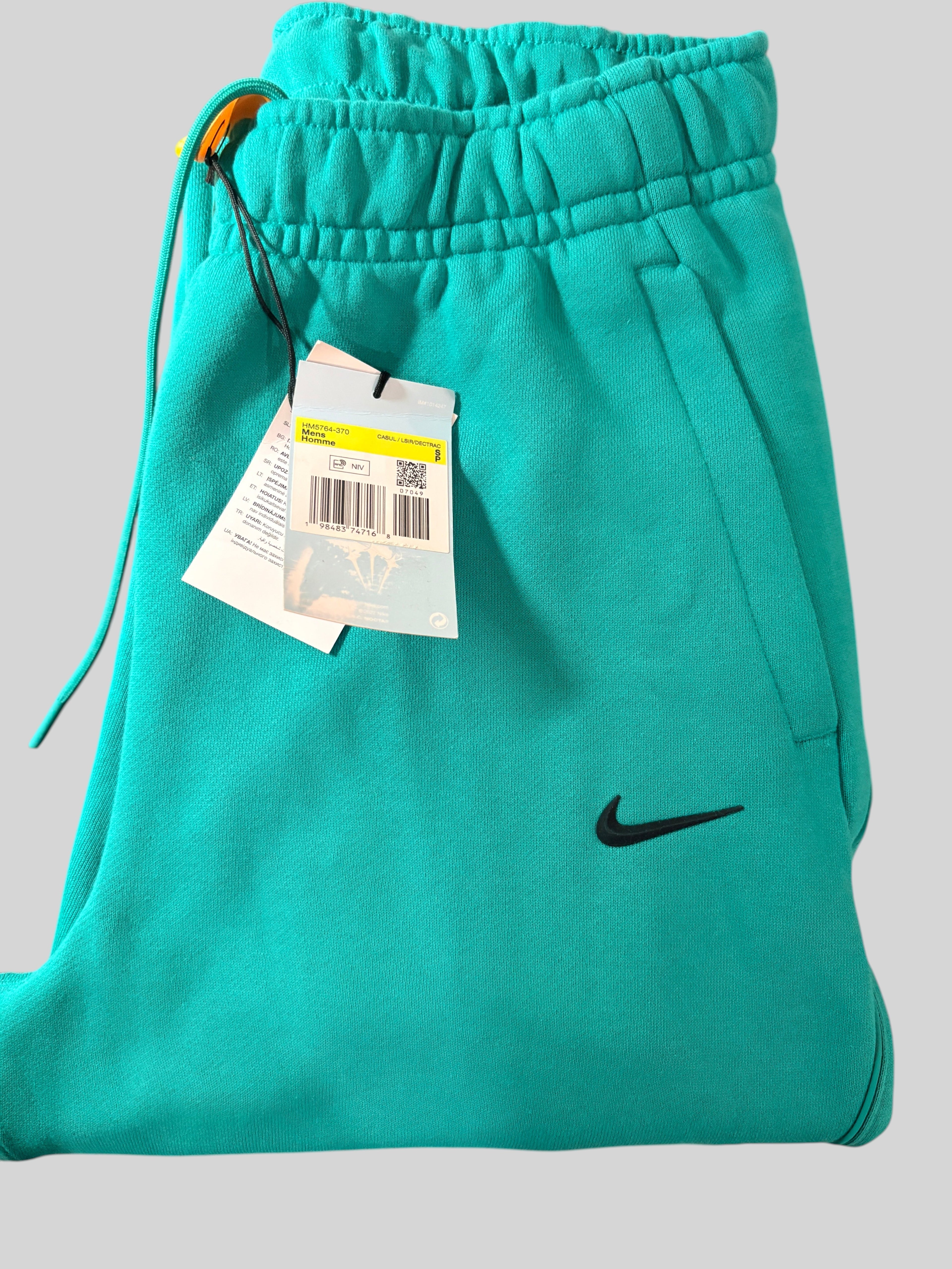Pantalon de survêtement FASHION SC Nike x NOCTA Fleece CS vert Neptune avec logo Swoosh noir et étiquette d'origine