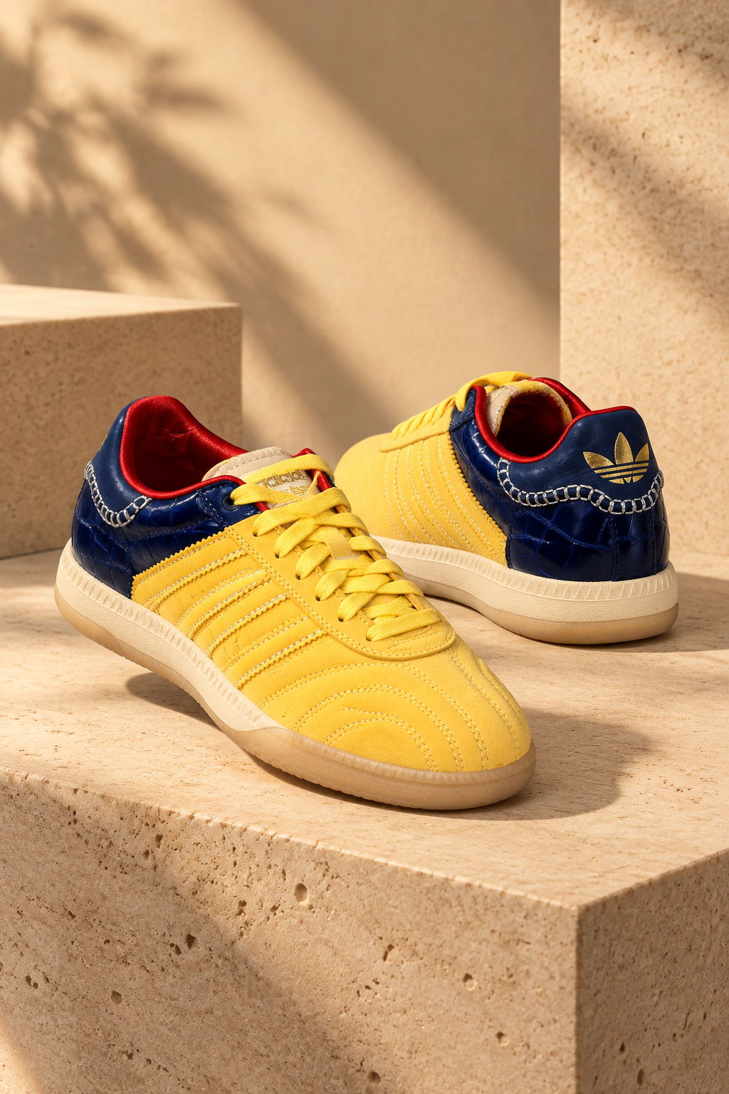 Sneakers jaunes mises en valeur sur des blocs de pierre claire
